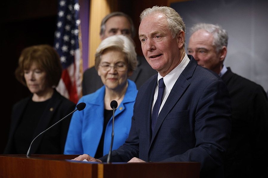 Sen. Chris Van Hollen (D-Md.), at podium, and fellow Senate Democrats hold a news conference at the U.S. Capitol on February 9 to celebrate a new Biden administration policy that demands that recipients of U.S. foreign military aid adhere to international humanitarian law. (Photo by Chip Somodevilla/Getty Images)