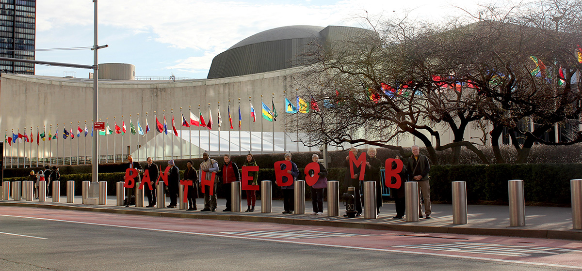 Supporters of the International Campaign to Abolish Nuclear Weapons stand outside the United Nations on March 30 as negotiations were underway inside the building involving representatives of about 130 countries. (Photo credit: Clare Conboy/ICAN)
