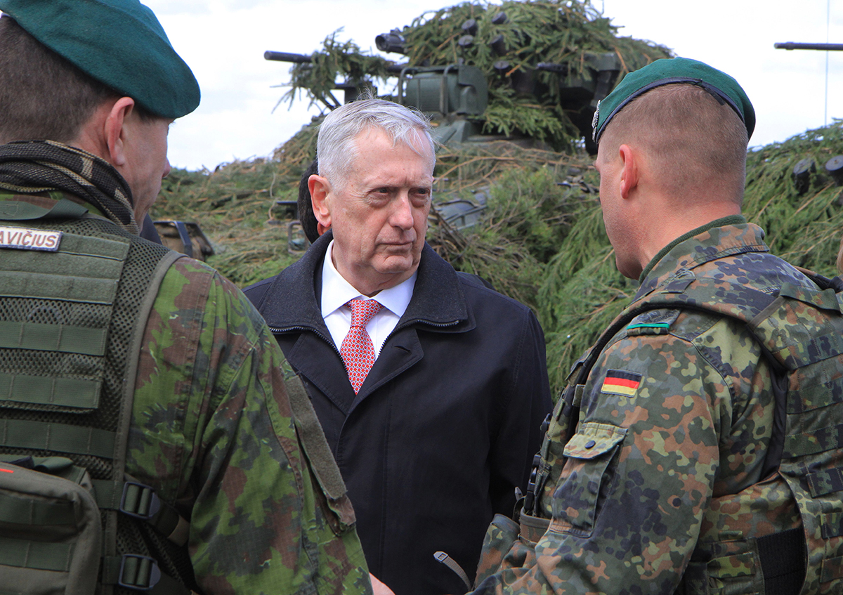 U.S. Defense Secretary Jim Mattis talks with soldiers during a visit to NATO’s enhanced Forward Presence Battlegroup in Lithuania on May 10. The United States and its European allies have increased their military presence in response to perceived Russian threats to nearby NATO members, such as the Baltic states. (Photo credit: Petras Malukas/AFP/Getty Images)