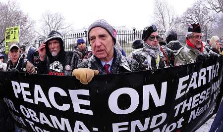 Daniel Ellsberg(C), former military analyst who released the ‘Pentagon Papers’ in 1971, speaks to the media during an anti-war protest December 16, 2010 in front of the White House. (Photo: KAREN BLEIER/AFP/Getty Images)