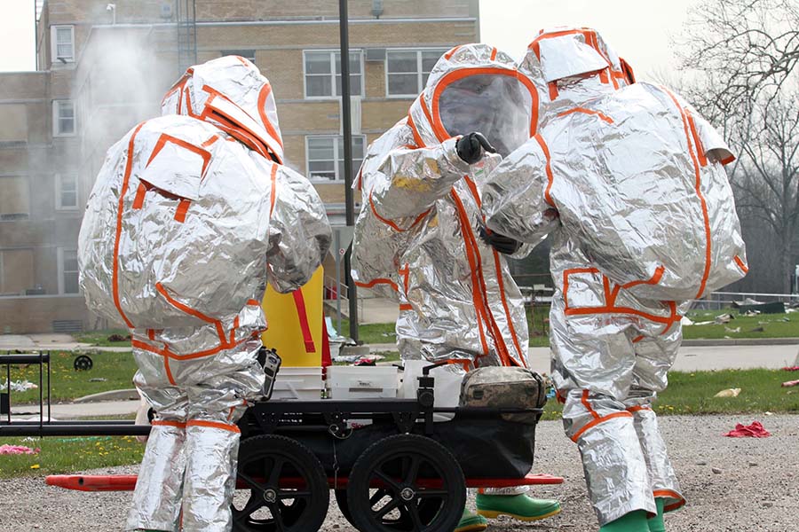 U.S. Army soldiers, dressed in metallic protective suits, conduct a radiation-reconnaissance activity April 22 during Guardian Response 18, a training exercise to validate Army units’ ability to support civil authorities in the event of a chemical, biological, radiological, or nuclear event. (U.S. Army Reserve photo by Staff Sgt. Christopher J. Sofia, 78th Training Division)