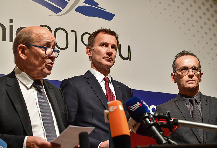 French Foreign Minister Jean-Yves Le Drian (left), UK Foreign Secretary Jeremy Hunt (center), and German Foreign Minister Heiko Maas met the press in Romania on Jan. 31 to announce the creation of a financial mechanism to enable European trade with Iran in the face of U.S. sanctions.  (Photo: Daniel Mihailescu/AFP/Getty Images)