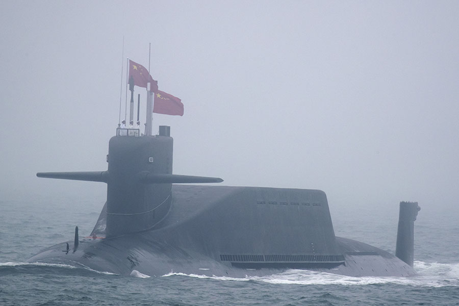 A Chinese Jin-class nuclear submarine participates in a naval parade on April 23. (Photo: Mark Schiefelbein/AFP/Getty Images)