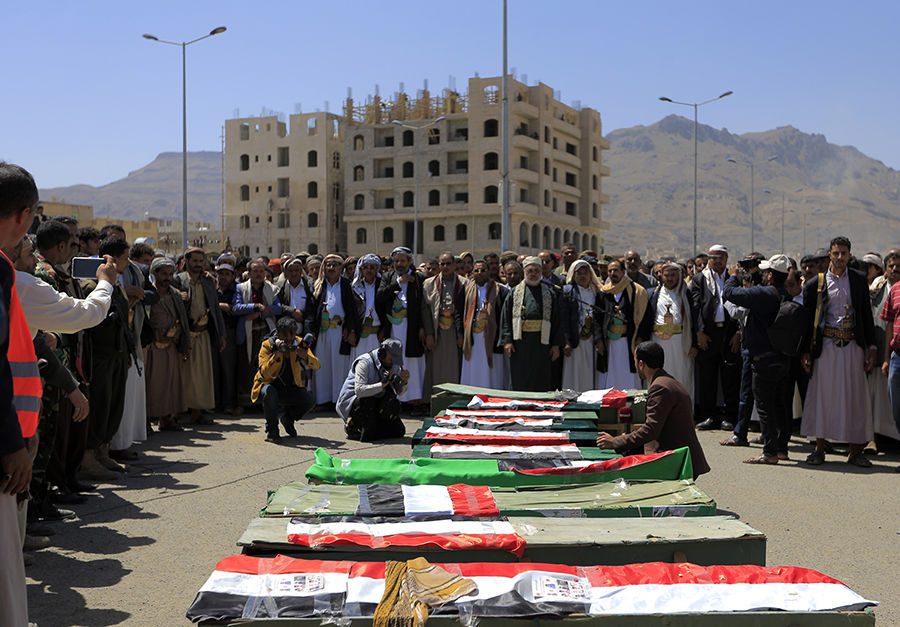Yemenis gather around the coffins of schoolchildren during a funeral in Sanaa in April. Data collected by the Cluster Munition Monitor indicates that noncombatants have comprised more than 85 percent of all casualties from cluster munitions in the past decade. (Photo: Mohammed Huwais/AFP/Getty Images)