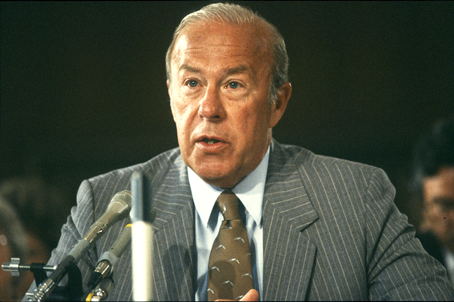 George Shultz testifies before the U.S. Senate Committee on Foreign Relations during the confirmation hearing on his appointment as U.S. Secretary of State, Washington D.C., July 13, 1982. (Photo: Benjamin E. 'Gene' Forte/CNP/Getty Images)