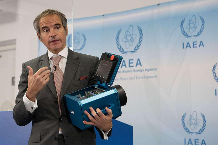 Director-General Raphael Mariano Grossi of the International Atomic Energy Agency (IAEA), at IAEA headquarters in Vienna, displays the kind of surveillance camera used to monitor Iran's nuclear program. (Photo by ALEX HALADA/AFP via Getty Images)