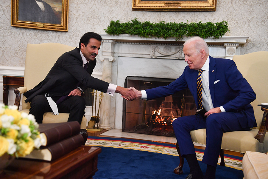 U.S. President Joe Biden meets Sheikh Tamim Bin Hamad Al Thani, the emir of Qatar, at the White House on January 31. Biden announced that he was adding the Gulf state to the list of major non-NATO allies. (Photo by Nicholas Kamm/AFP via Getty Images)