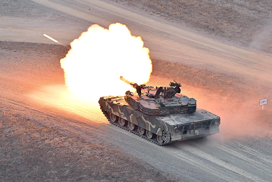 A South Korean K1A1 tank fires during a live fire drill at a military training field in Pocheon on March 22, as part of the 10-day-long Freedom Shield joint military exercises with the United States, the allies’ largest in five years. North Korea responded to the exercises with repeated missile launches. (Photo by Jung Yeon-Je/AFP via Getty Images)