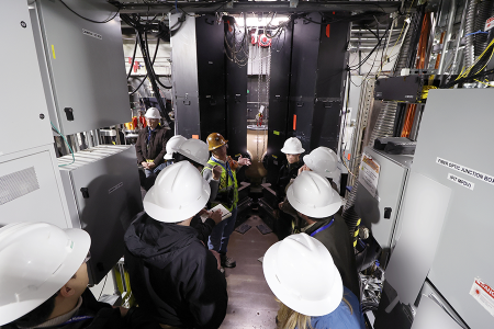 Officials at the U.S. National Nuclear Security Site answer questions from nongovernmental experts about the operation of the Cygnus subcritical experiment machine in the site’s “zero room” in November. (Photo U.S. National Nuclear Security Administration)