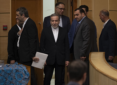 Iran’s new foreign minister is Abbas Araghchi (C, front), a career diplomat who played a key role in negotiating the 2015 nuclear deal, known as the Joint Comprehensive Plan of Action, with the United States, the United Kingdom, France, Germany, China and Russia. (Photo by Morteza Nikoubazl/NurPhoto via Getty Images)