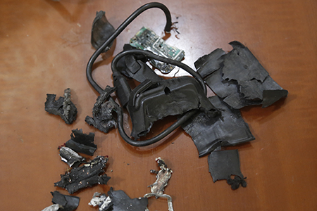 A photo taken in the southern suburbs of Beirut on Sept. 18 shows the remains of exploded pagers on display at an undisclosed location. Hundreds of pagers used by members of Hezbollah exploded across Lebanon a day earlier, causing thousands of casualties. (Photo by AFP via Getty Images)