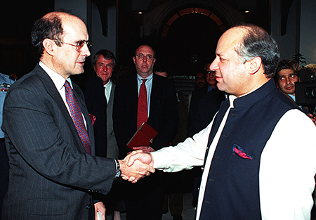 Pakistani Prime Minister Nawaz Sharif (R) says goodbye to Strobe Talbott, U.S. assistant secretary of state, after a meeting in Islamabad on May 15, 1998, concerning India’s recent nuclear tests. Sharif said Pakistan was in “no haste” to conduct its own nuclear test but on May 28, it carried out five of them. (Photo by -/HO/AFP via Getty Images)