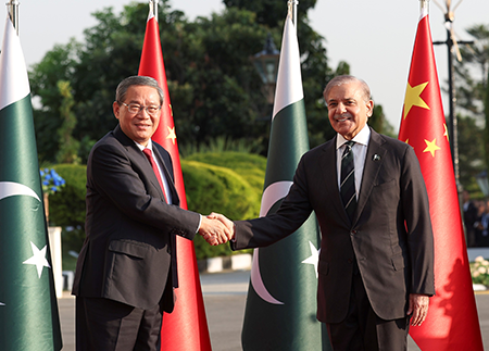 Chinese Premier Li Qiang (L) meets Pakistani Prime Minister Shehbaz Sharif at the prime minister’s office in Islamabad on October 14. Members of the Nuclear Suppliers Group are concerned about China’s nuclear trade with Pakistan.  (Photo by Ding Haitao/Xinhua via Getty Images)