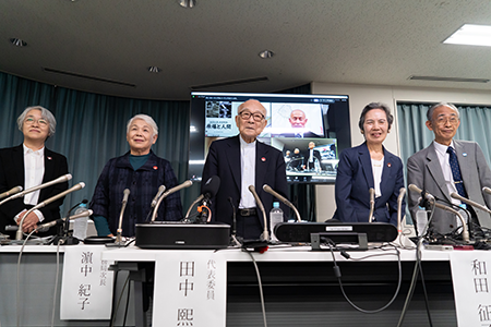 Members of Nihon Hidankyo, a Japanese organization of atomic bomb survivors from Hiroshima and Nagasaki, at a press conference after the group was awarded the 2024 Nobel Peace Prize. From left to right, they are: Masako Kudo, head of the administration office; Toshiko Hamanaka, assistant secretary-general; Terumi Tanaka, co-chair; Masako Wada, and Jiro Hamasumi, both assistant secretaries-general. (Photo by Tomohiro Ohsumi/Getty Images)