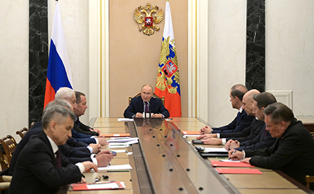 Russian President Vladimir Putin (C) holds a Russian Security Council meeting on nuclear deterrence with Security Council members in Moscow, Russia on Sept. 25. (Photo by Kremlin Press Office / Handout /Anadolu via Getty Images)