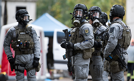 Heavily weaponized German police officers in Berlin can be seen during a training exercise for terror attacks with biological weapons in 2017. A working group created under the Biological Weapons Convention is engaged in a four year effort to strengthen the treaty. (Photo by Bernd von Jutrczenka/picture alliance via Getty Images)