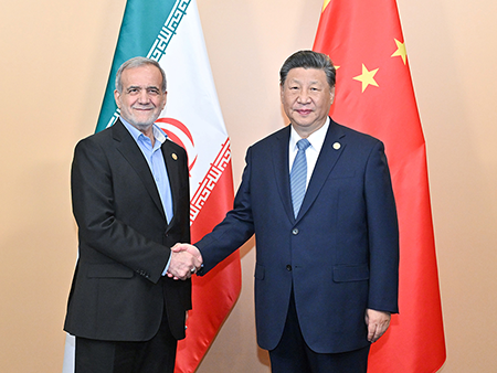 During his first presidency, Donald Trump hoped his "maximum pressure" campaign would bring Iran into a new relationship with the United States but Iran increasingly has become aligned with China. Here, Chinese President Xi Jinping (R) and Iranian President Masoud Pezeshkian met on the sidelines of the BRICS Summit in Kazan, Russia, in October. (Photo by Yue Yuewei/Xinhua via Getty Images)