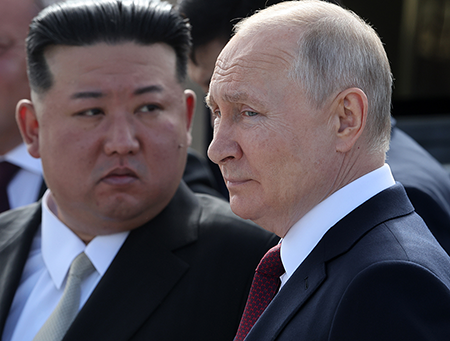 Warming ties between North Korean leader Kim Jong-un (L) Russian President Vladimir Putin, pictured last year at a meeting in Tsiolkovsky, Russia, is one complicating factor for U.S. President-elect Donald Trump as he contemplates policy toward the Korean peninsula. (Photo by Contributor/Getty Images)