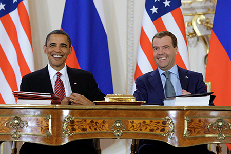 It was all smiles in 2010 as U.S. President Barack Obama (L) and his Russian counterpart, Dmitry Medvedev, sign the New Strategic Arms Reduction Treaty (New START), committing the two nations to major cuts in deployed warheads and delivery vehicles, in Prague on April 8, 2010. The pact expires on February 5, 2026, when the two sides will be free to expand their arsenals.  (Photo by Dmitry Astakhov/Ria Novosti/AFP via Getty Images)