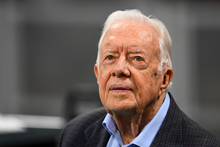 Former U.S. President Jimmy Carter in 2018 prior to the game between the Atlanta Falcons and the Cincinnati Bengals at Mercedes-Benz Stadium in Atlanta. (Photo by Scott Cunningham/Getty Images)