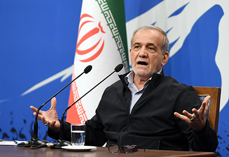 During a press conference in Tehran in September, Iranian President Masoud Pezeshkian insists that his country has no intention of developing nuclear weapons, despite reports by the International Atomic Energy Agency that Iran has expanded significantly its production of uranium enriched to near weapons-grade level. (Photo by Shadati/Xinhua via Getty Images)