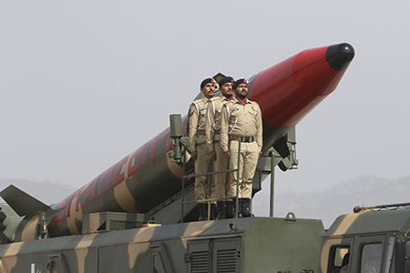 Pakistani army soldiers stand on a vehicle carrying a Shaheen ballistic missile during the Pakistan Day parade in Islamabad in 2022. (Photo by Ghulam Rasool/AFP via Getty Images)