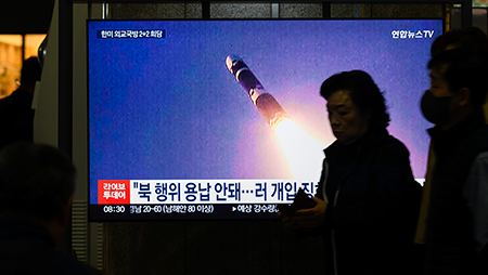 The test launch of North Korea’s new Hwasong-19 intercontinental ballistic missile at an undisclosed location is seen last November via a 24-hour Yonhapnews TV broadcast at Yongsan Railway Station in Seoul. (Photo by Kim Jae-Hwan/SOPA Images/LightRocket via Getty Images)