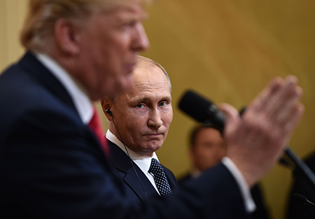 U.S. President Donald Trump and Russia's President Vladimir Putin attend a joint press conference after a meeting at the Presidential Palace in Helsinki, on July 16, 2018. (Photo by Brendan Smialowski/AFP via Getty Images)