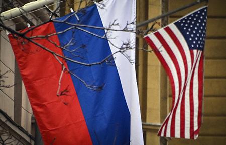 Russian and U.S. flags are seen at the U.S. Embassy in central Moscow on November 5, 2024, at the day of U.S. Presidential election. (Photo by Alexandor Nemenov/AFP via Getty Images)