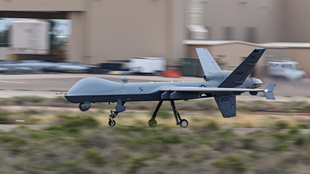 An MQ-9 Reaper unmanned vehicle accelerates down a runway at Holloman Air Force Base, New Mexico, Aug. 27. The U.S. Department of Defense, seeking to build its forces, plans to procure vast numbers of cheap, disposable drones along with fewer numbers of highly capable but more expensive unmanned combat vehicles. (U.S. Air Force photo by Senior Airman Bob Teichmann)