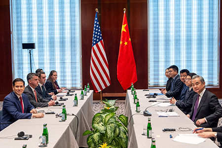 U.S. Secretary of State Marco Rubio (L) and China’s Foreign Minister Wang Yi (R) meet in Munich Feb. 13 on the sidelines of the Munich Security Conference, days after Washington accused Beijing of conducting a nuclear weapons test in 2020 and preparing to conduct many more. (Photo by Alex Brandon / Pool / AFP via Getty Images)