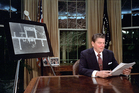 U.S. President Ronald Reagan prepares to address the nation from the Oval Office in 1983 on his Strategic Defense Initiative, commonly called “Star Wars.” (Photo by: Universal History Archive/Universal Images Group via Getty Images)