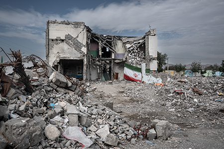 The remains of the Shajareh Tayyebeh Primary School in Minab, Iran, which was bombed Feb. 28, resulting in the deaths of over 170 people, mostly students. The New York Times, citing U.S. officials, reported that an ongoing investigation determined that the United States is responsible for the strike. (Photo by Hamid Vakili/Anadolu via Getty Images)