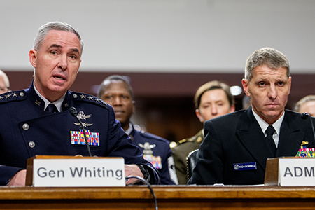 Gen. Stephen Whiting, commander of the U.S. Space Command (left), accompanied by Navy Adm. Richard Correll, commander of the U.S. Strategic Command (right), speaking during a Senate Armed Services Committee hearing on the Pentagon budget March 26. (Photo by Andrew Harnik/Getty Images)