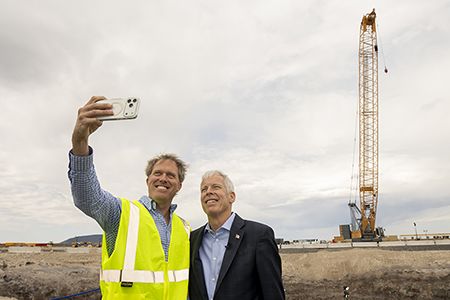 Jacob DeWitte (L), cofounder and ceo of Oklo Inc., takes a selfie with U.S. Secretary of Energy Chris Wright as they tour the company’s Aurora Powerhouse site at Idaho National Laboratory in Idaho Falls, June 25. Wright is a former Oklo board member. (Photo by Natalie Behring/Getty Images)
