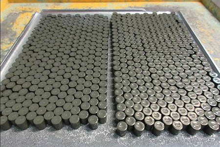 Working out safeguards is one challenge created by the expansion of microreactors, expert Zohaib Altaf writes. Many advanced reactors depend on high-assay, low-enriched uranium (HALEU) for fuel and wider use would mean larger inventories of this nuclear fuel transiting the world. Russia used to be the prime supplier but Westinghouse Electric Co. last year produced its first HALEU fuel pellets, shown above. (Photo from Westinghouse Electric Co.)