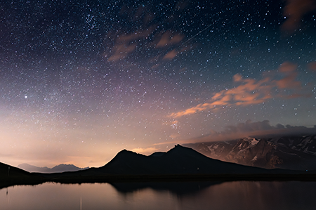 Although the great powers have reaffirmed their commitment to the peaceful uses of outerspace, they are developing counterspace capabilities, and some have placed dual-use systems in orbit. Photo shows the skies during a Perseid shooting star shower over Auvergne-Rhone-Alpes, France in 2024. (Photo by Jerome Gilles/NurPhoto via Getty Images)