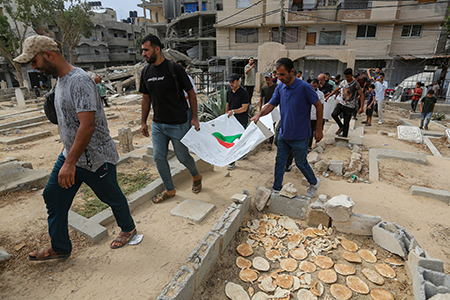 A funeral is held for 50 Palestinians killed in the Israel-Hamas war Sept. 29 in Nuseirat, Gaza. Despite international outrage over Israel’s military attacks on Gaza and Lebanon, the Trump administration plans to sell Israel another $2.8 billion in weapons, including 40,000 one-ton bombs. (Photo by Ahmad Hasaballah/Getty Images)