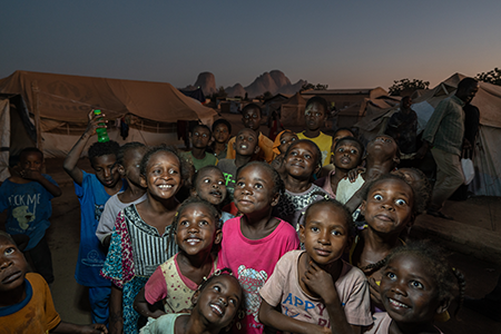 Children at the Omar Haj Musa internally-displaced persons site in eastern Sudan. The site is home to hundreds of families, displaced from cities south of Khartoum as fighting between the government and opposition Rapid Support Forces spread between late 2023 and 2024. (Photo by Giles Clarke/UNOCHA via Getty Images)