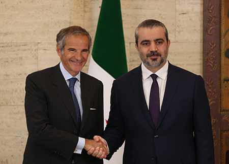 Syrian Foreign Minister Asaad al-Shibani (R) and International Atomic Energy Agency Director-General Rafael Mariano Grossi meet in Damascus in August. One month later, the agency’s board of governors closed its investigation into Syria’s nuclear program after the new government resolved long-standing questions about the Assad regime’s illicit activities. (Photo by Izz Aldien Alqasem/Anadolu via Getty Images)