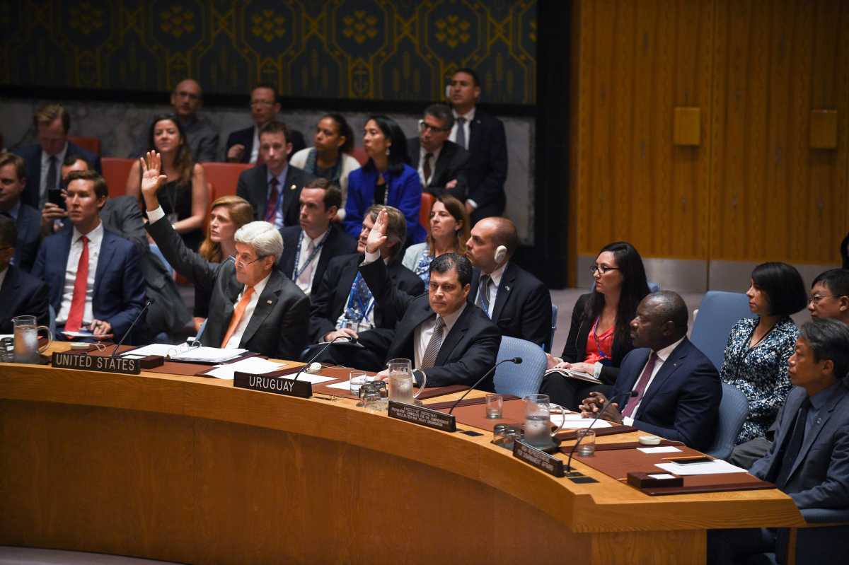 U.S. Secretary of State John Kerry and other diplomats vote to adopt the resolution in support of the Comprehensive Test Ban Treaty during a UN Security Council meeting September 23. (Photo credit: Astrid Riecken/CTBTO)