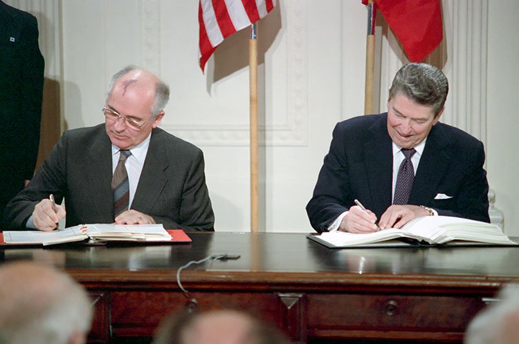 U.S. President Ronald Reagan and Soviet General Secretary Mikhail Gorbachev sign the Intermediate-Range Nuclear Forces Treaty in the East Room of the White House on December 8, 1987. (Photo credit: Ronald Reagan Presidential Library)